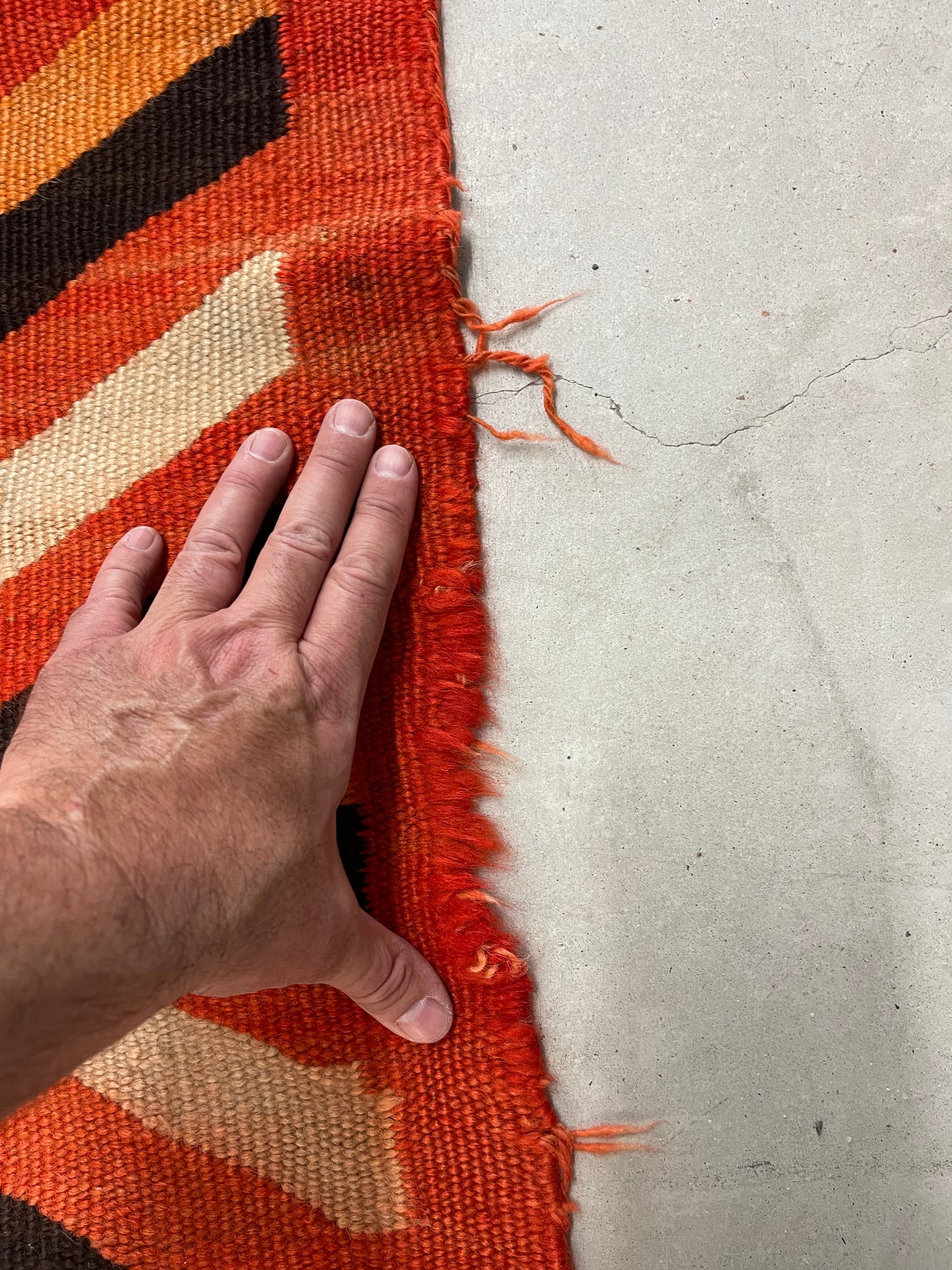 Holes to be repaired on a Navajo Rug