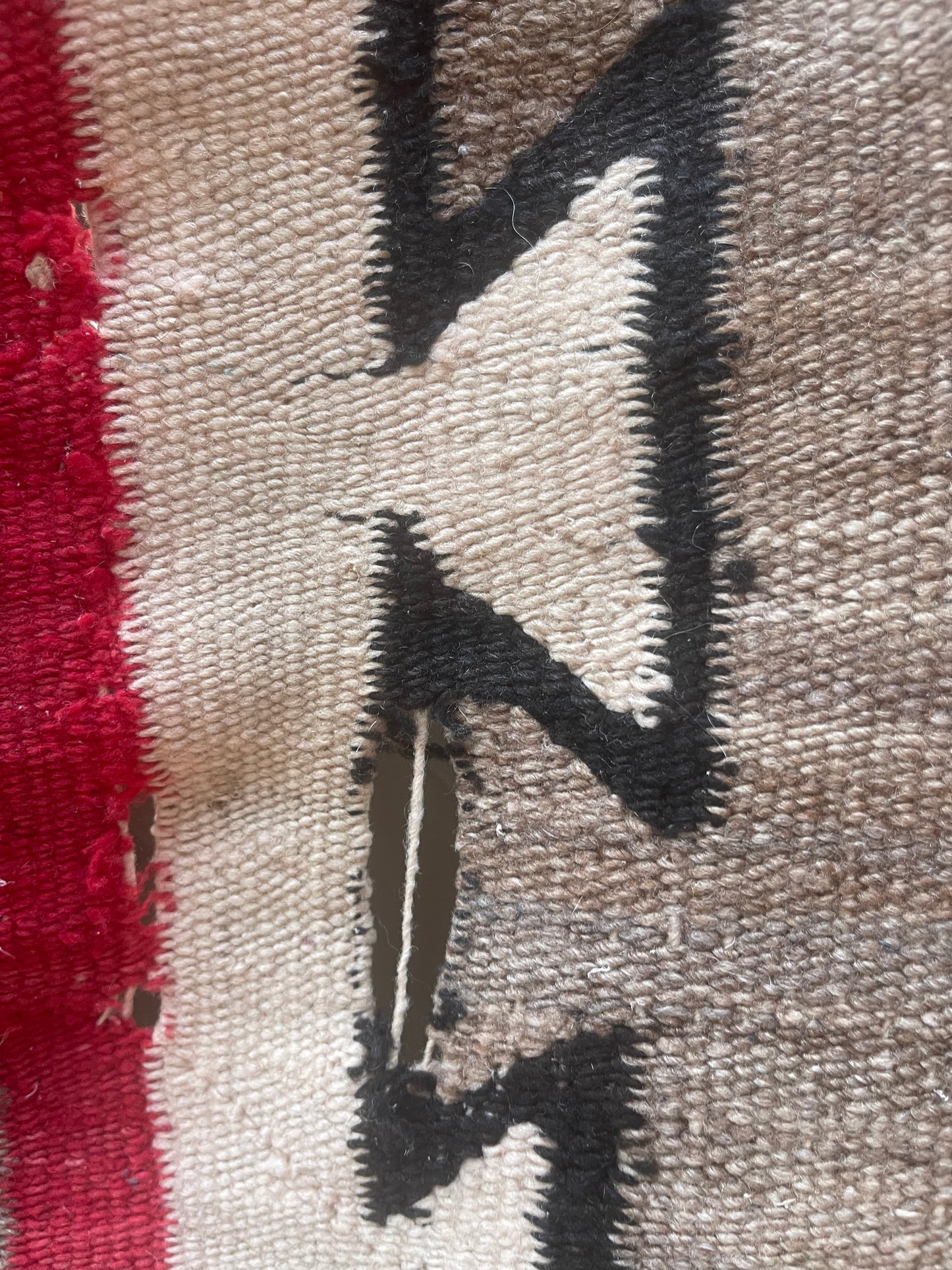 Holes to be repaired on a Navajo Rug
