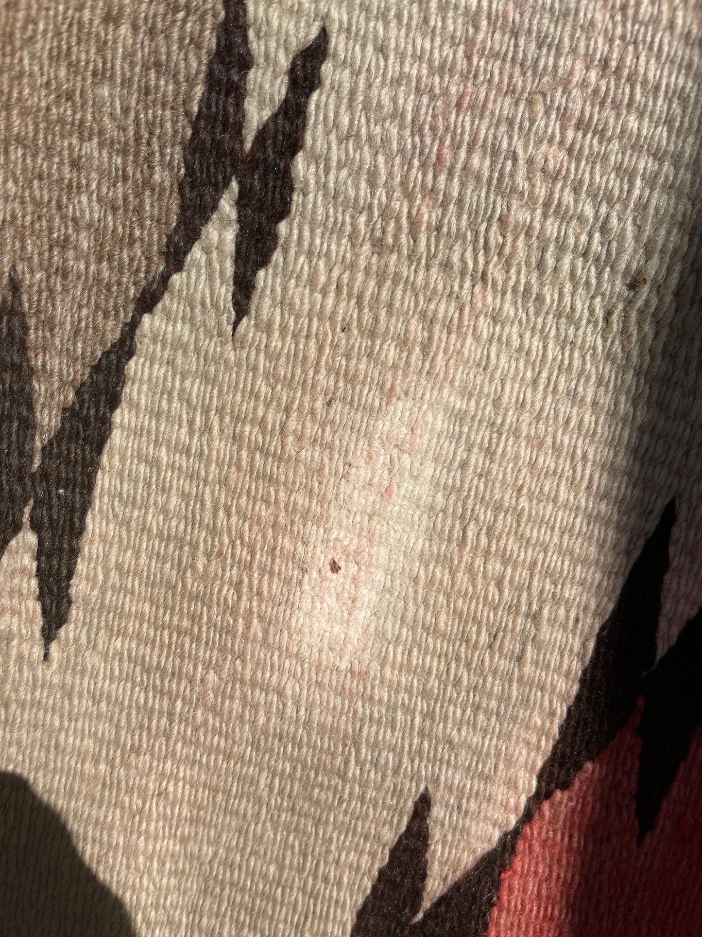 Red Color Bleed being removed on a Navajo rug