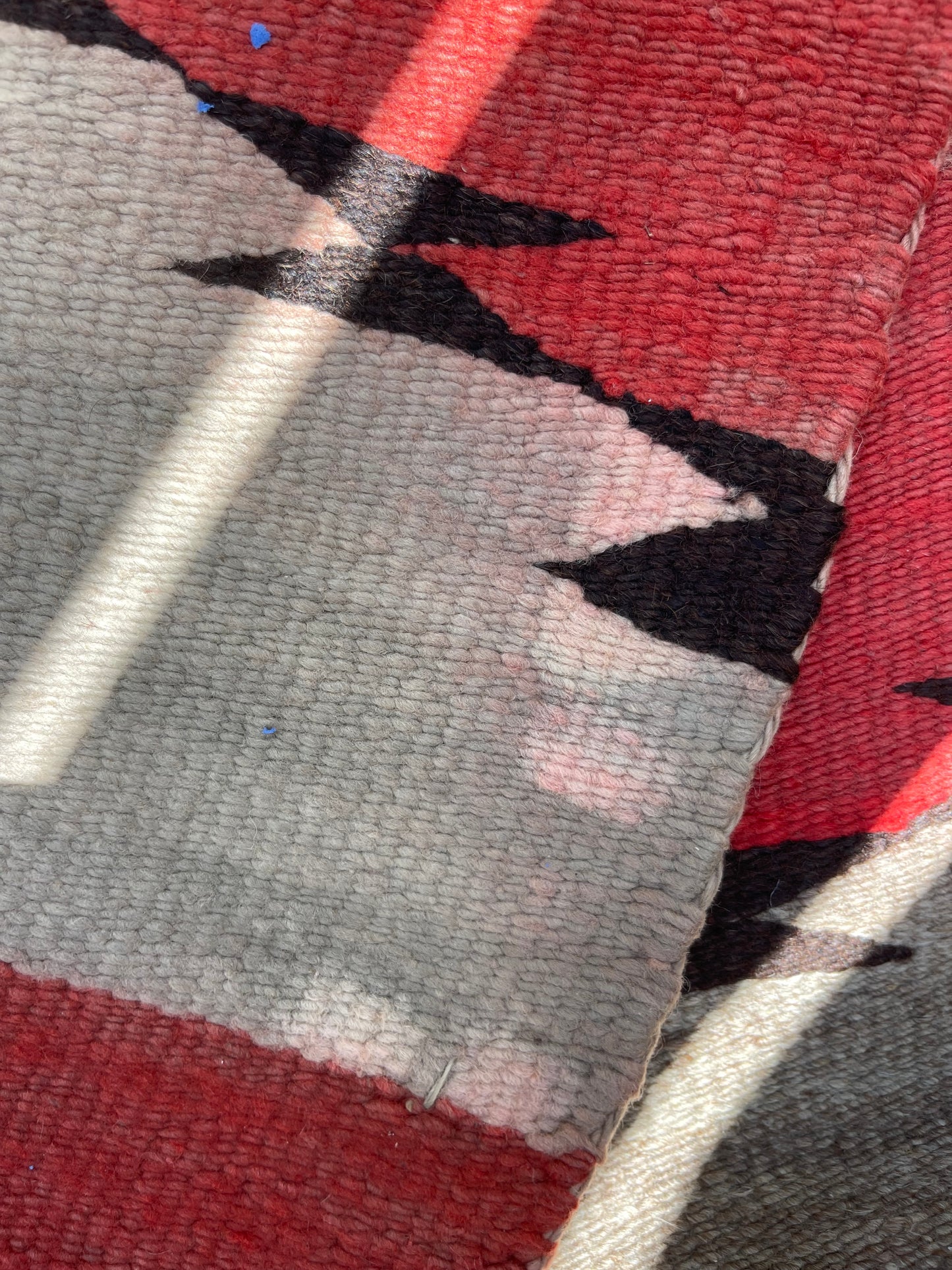 Red Color Bleed being removed on a Navajo rug