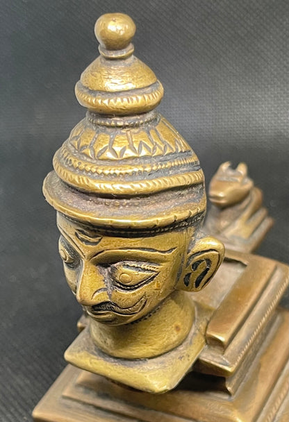 Antique heavy cast metal sculpture from India in two parts and a miniature Nandi figure