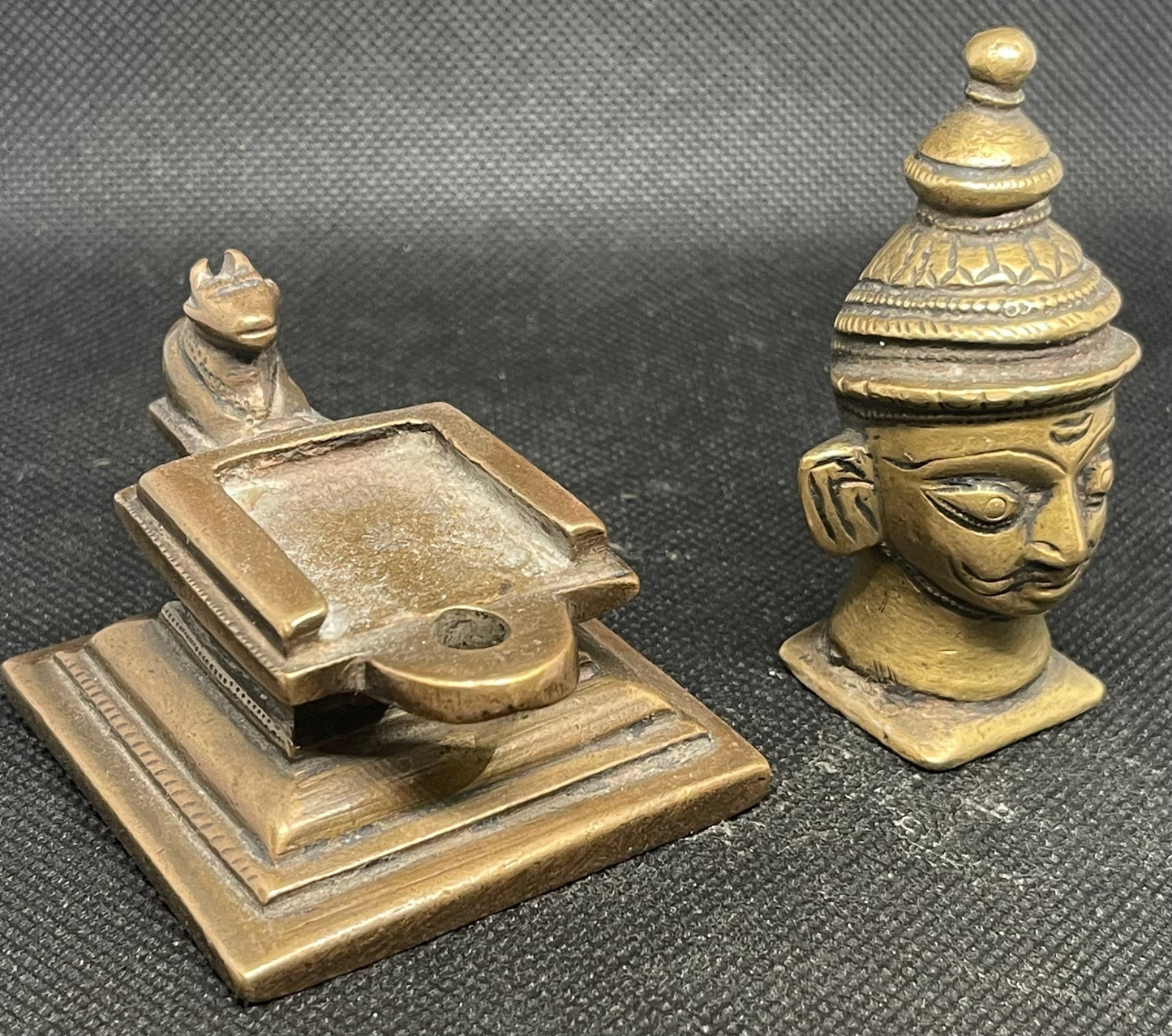 Antique heavy cast metal sculpture from India in two parts and a miniature Nandi figure