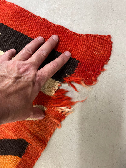 Holes to be repaired on a Navajo Rug