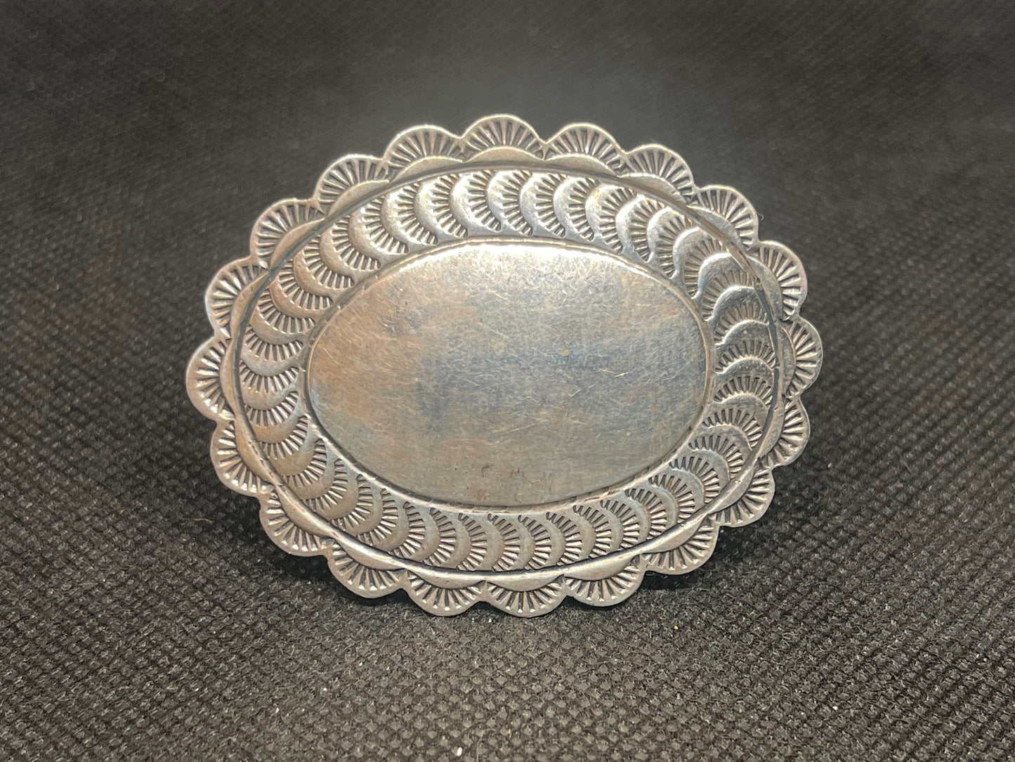 Vintage Sterling Silver Native American Pin Signed C Aguilar with hand embossed design Ex Private Collection