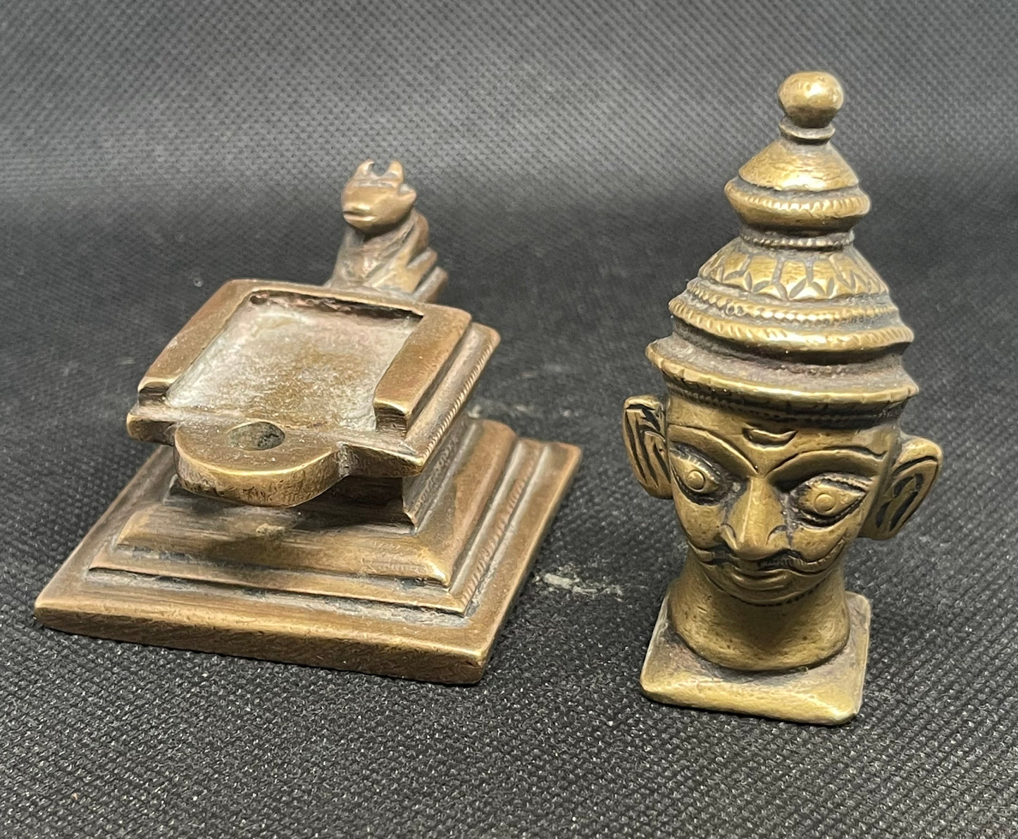 Antique heavy cast metal sculpture from India in two parts and a miniature Nandi figure