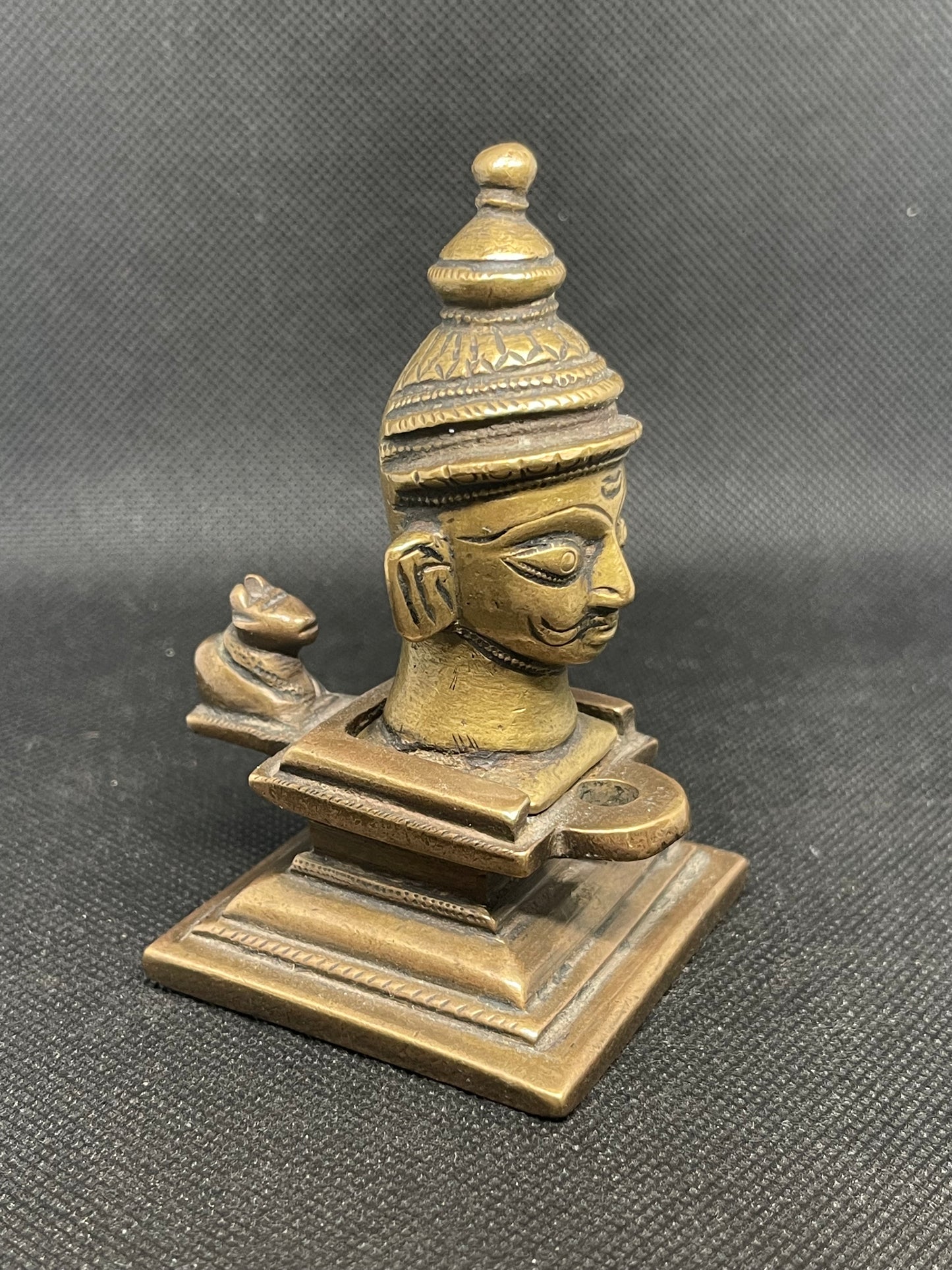 Antique heavy cast metal sculpture from India in two parts and a miniature Nandi figure