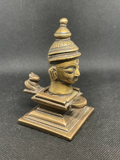 Antique heavy cast metal sculpture from India in two parts and a miniature Nandi figure