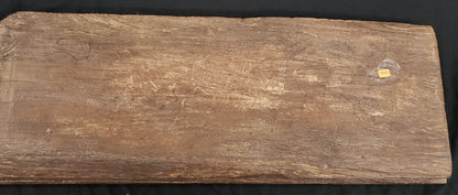 Antique heavily carved Buddhist panel with an old and original red painted surface