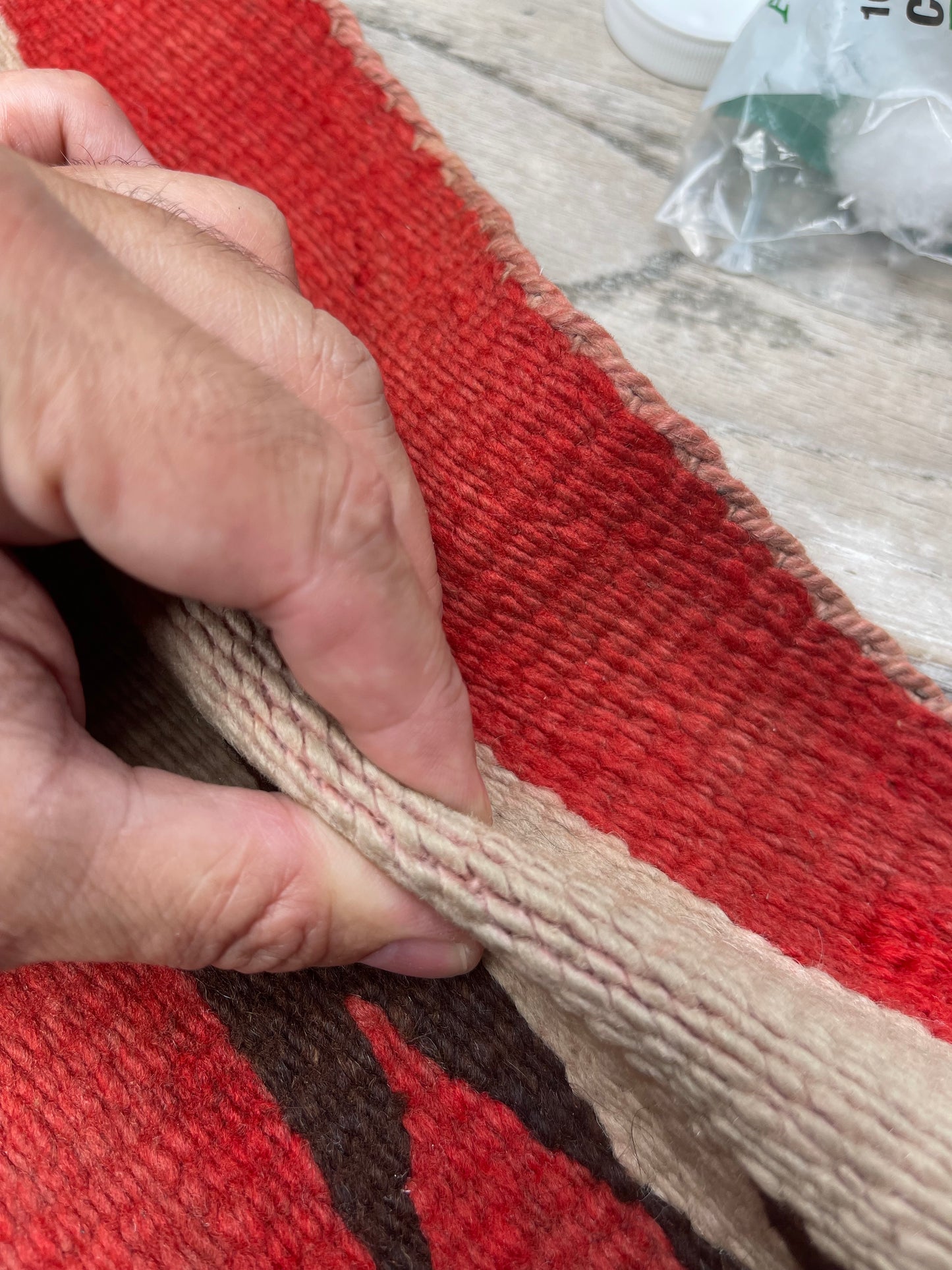 Red Color Bleed being removed on a Navajo rug