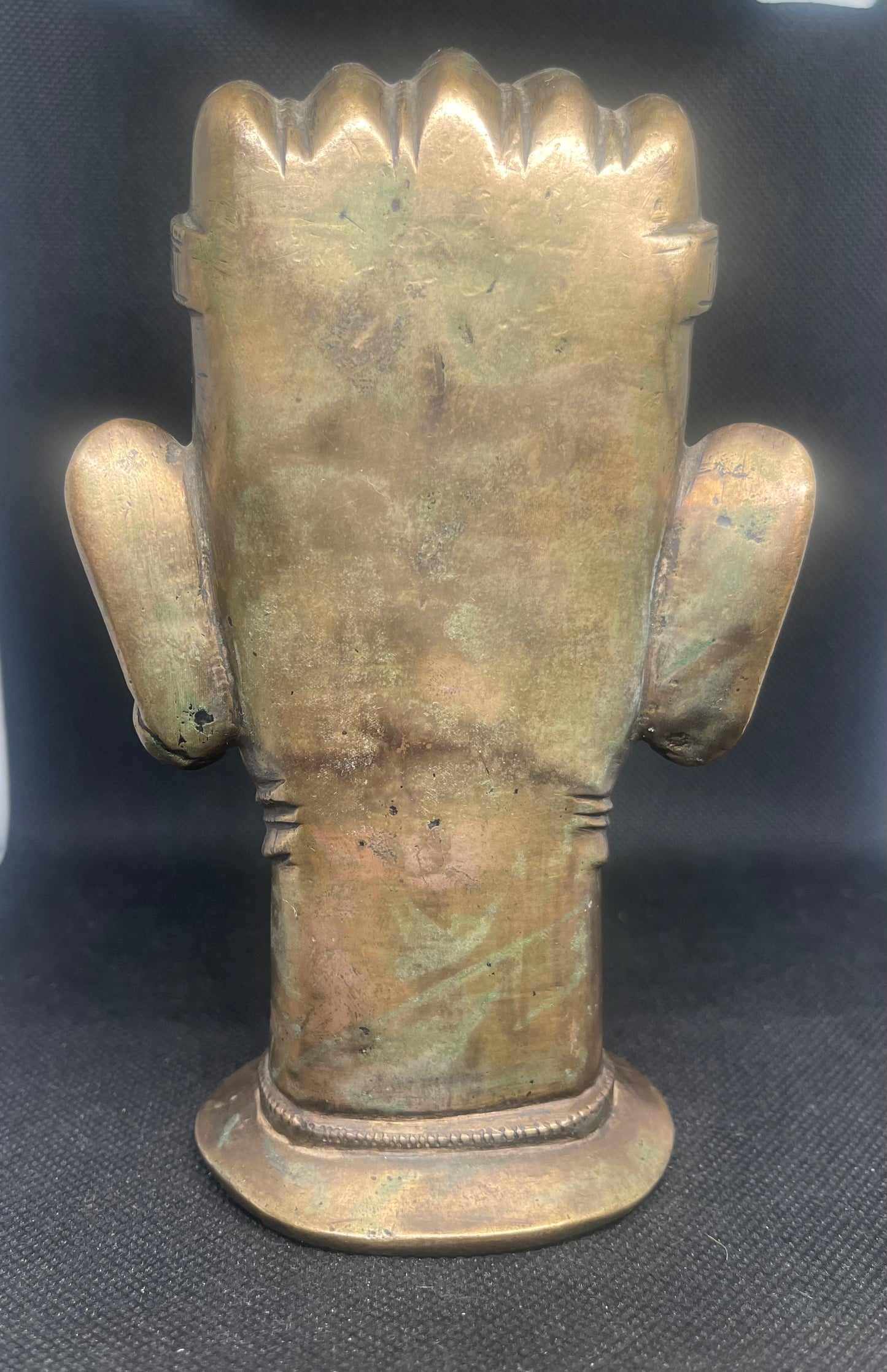 Antique Mukhalinga, depiction of Lord Shiva with beautiful turban,topped by a Linga and sitting on a rare attached base.